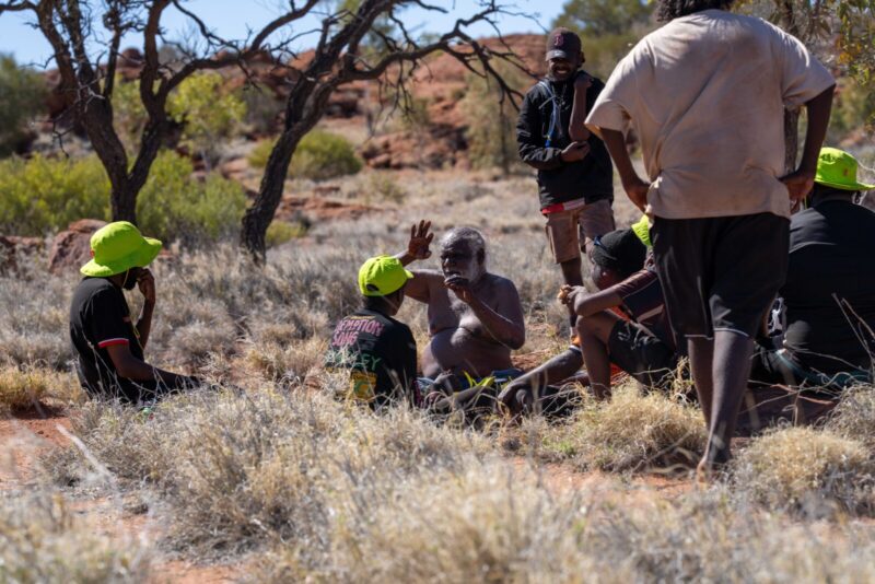 Mr Peter Mitchell teaching Tjukurpa, Kunapula outstation, Watiku Tjina Ankunytjaku (Men’s Walk), August 2025, Photo by Rhett Hammerton, ©NPYWC